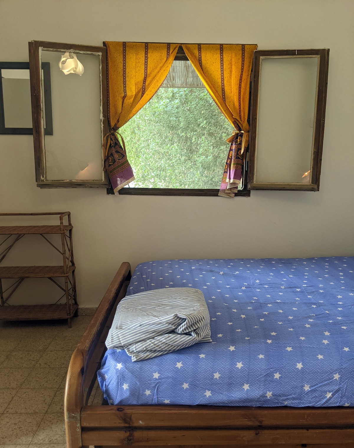 Garden Room queen bed at A-Hatser Rosh Pinna